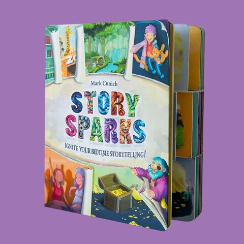 The book Story Sparks, a create your own story book by Mark Cunich on a purple background.