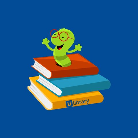 A cute green bookworm with red glasses on a stack of colourful books against a blue background.