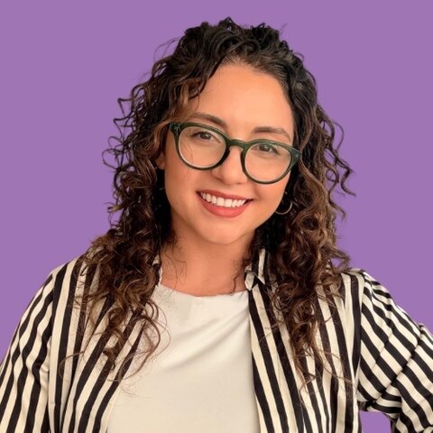 The author Alyssa Bermudez against a purple background.